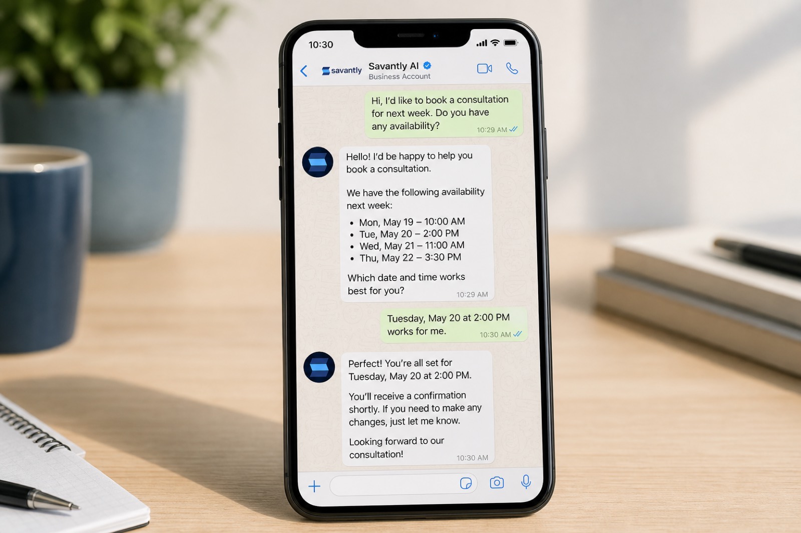 Phone showing an AI business chat reply about booking